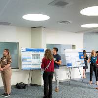 Long shot of poster presentations.